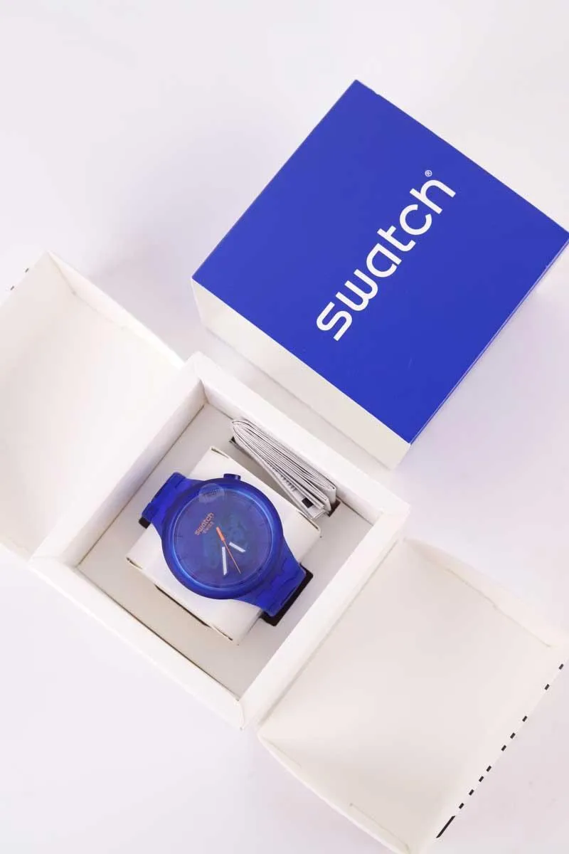 Montre Swatch bleue pour homme, taille standard, en excellent état, avec pochon inclus, en matière principale autres, de seconde